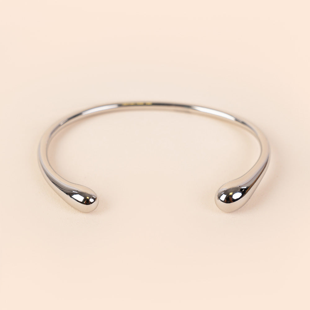 BRACCIALE RIGIDO CON ETREMITA' CRESCENTI