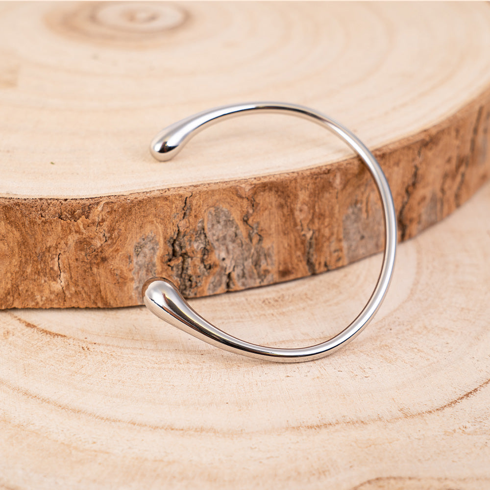 BRACCIALE RIGIDO CON ETREMITA' CRESCENTI