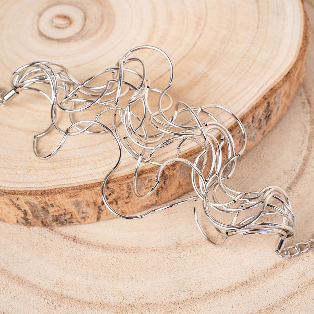 MULTI-STRING BRACELET WITH WAVY WEAVE