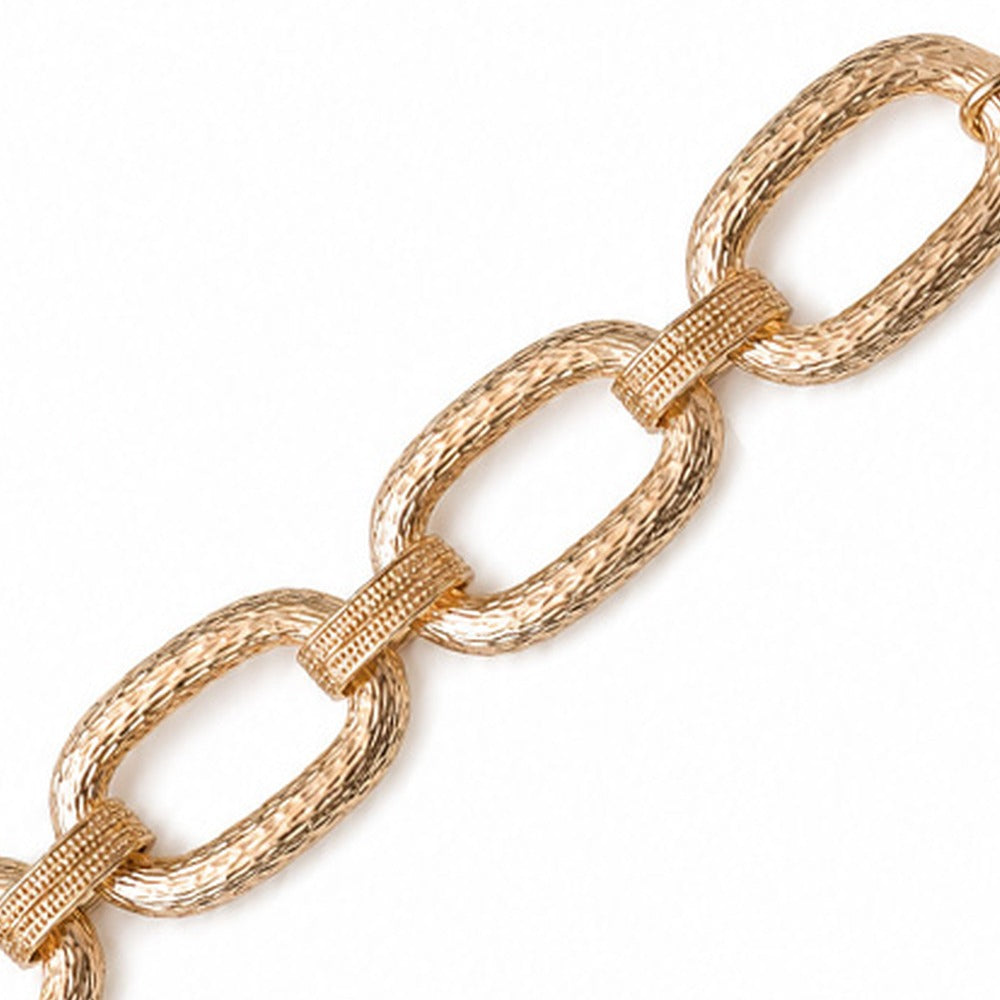 BRACCIALE  MORBIDO A MAGLIA LARGA DECORATA EFFETTO LEGNO