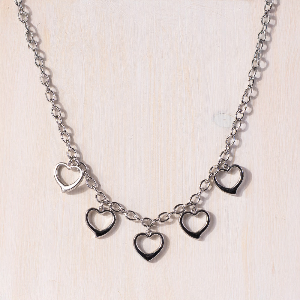 BRACCIALE MORBIDO A CATENA CON CUORE PENDENTE