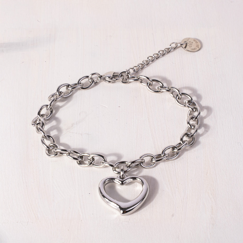 BRACCIALE MORBIDO A CATENA CON CUORE PENDENTE