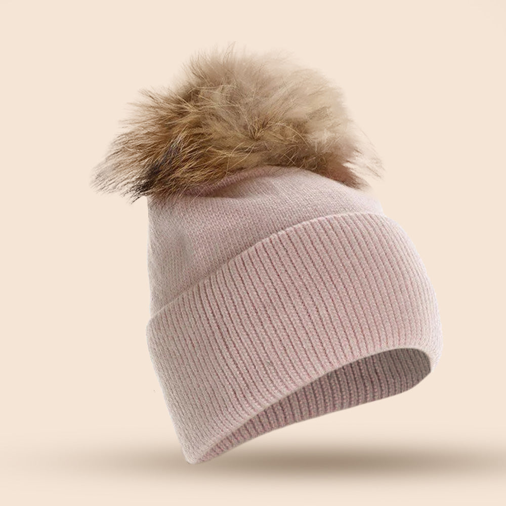 CAPPELLO A CUFFIA CON PON PON IN PELLICCIA