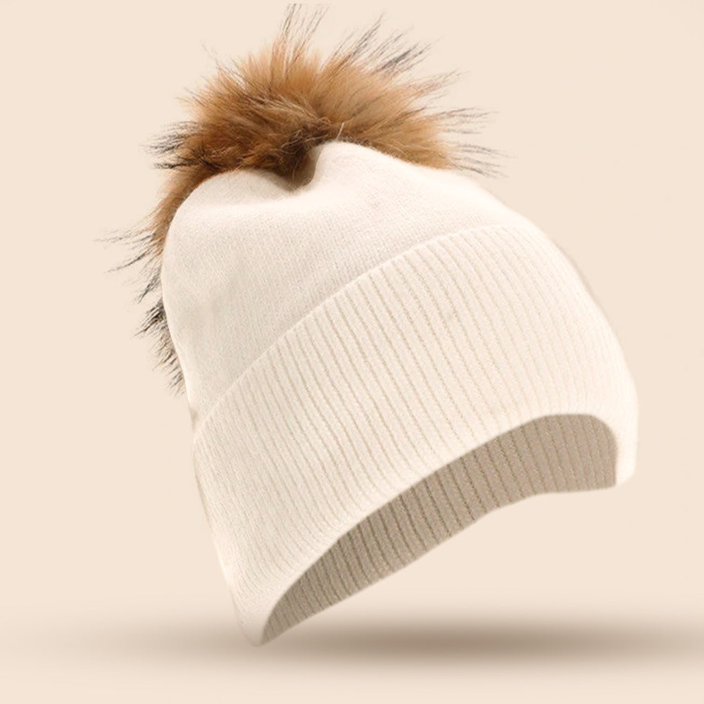 CAPPELLO A CUFFIA CON PON PON IN PELLICCIA