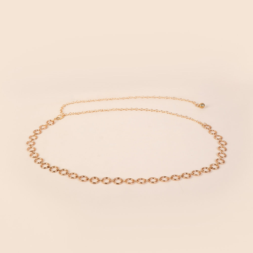 CINTURA GIOIELLO CON ELEMENTI CIRCOLARI MARTELLATI