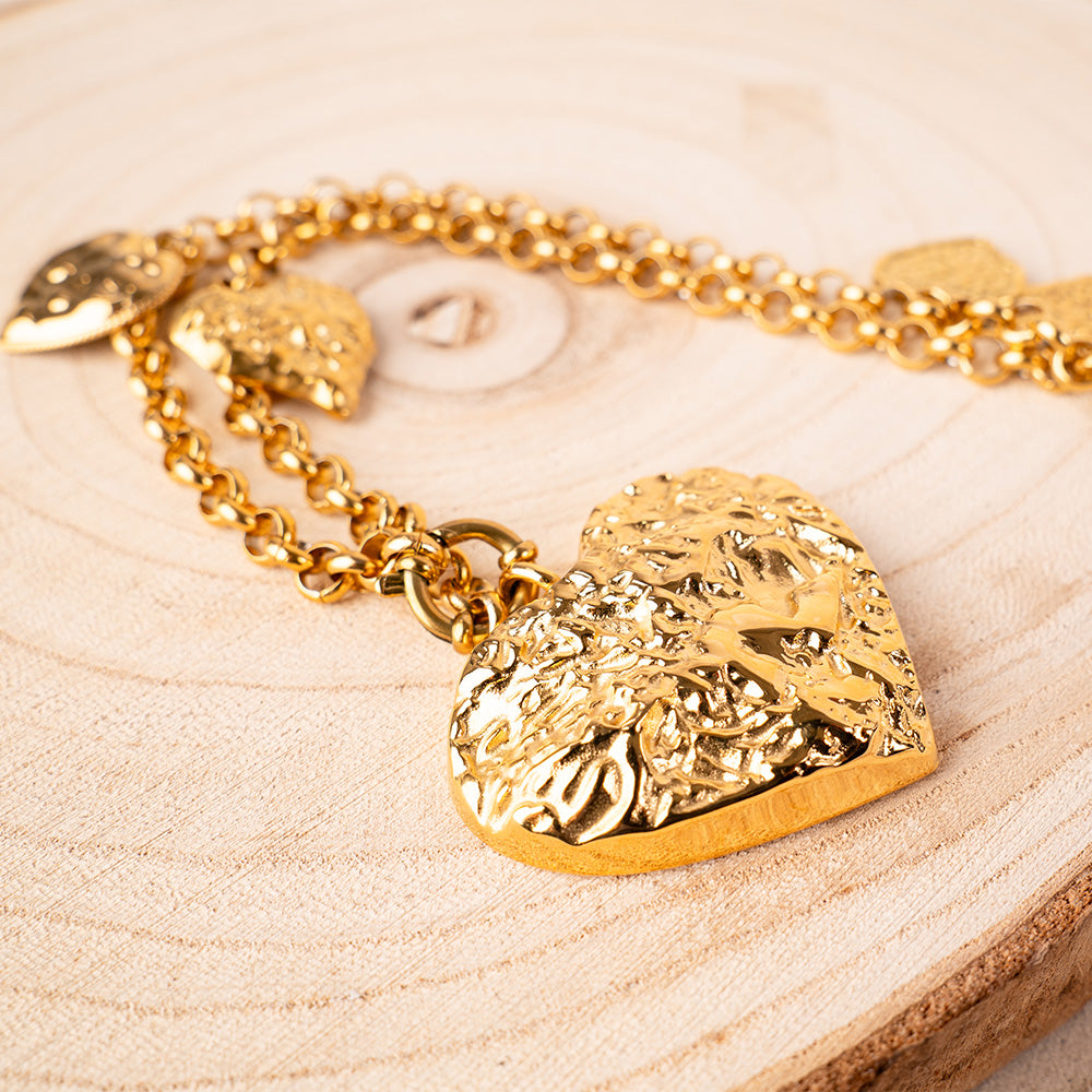 LONG NECKLACE WITH HAMMERED HEART PENDANTS OF DIFFERENT SIZES