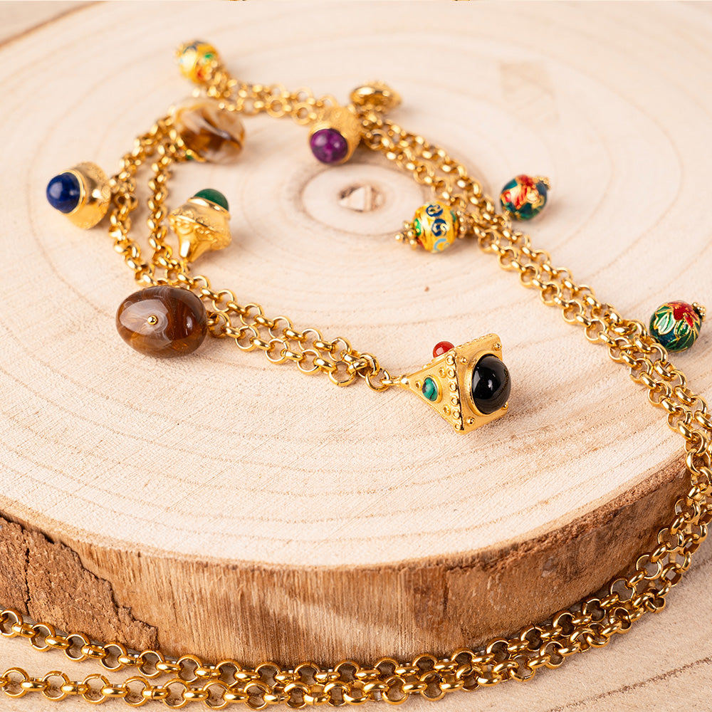 LONG NECKLACE WITH WORKED PENDANTS AND STONES