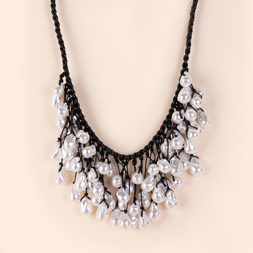 COLLANA LUNGA IN TESSUTO INTRECCIATO CON PERLE PENDENTI