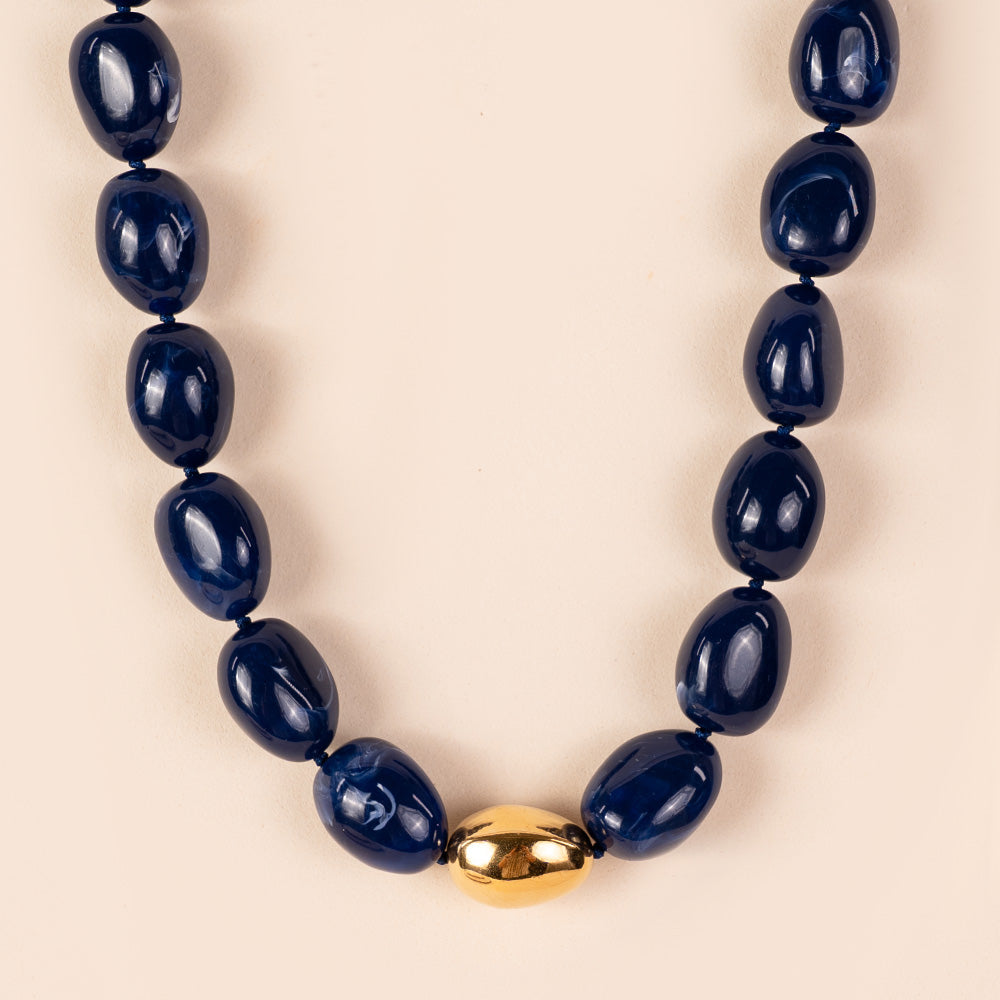 CHOKER NECKLACE WITH ASYMMETRIC COLORED STONES AND GOLDEN DETAIL