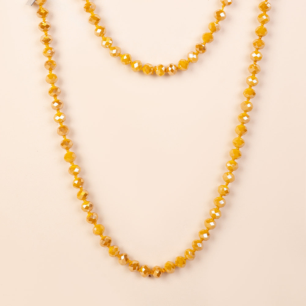 COLLANA LUNGA CON CRISTALLINI SFACCETTATI