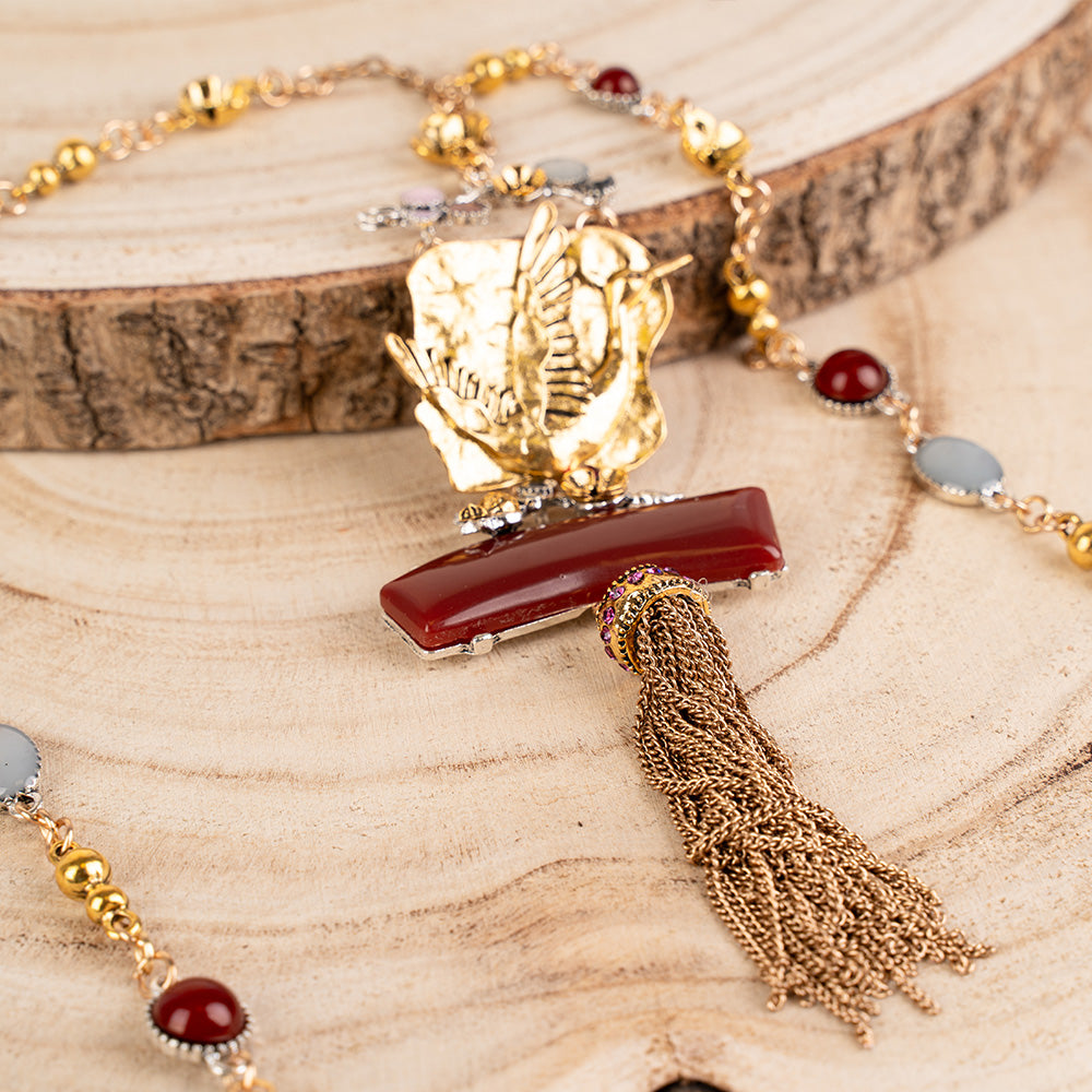 COLLANA LUNGA CON DETTAGLI COLORATI E PENDENTE CON CIGNO