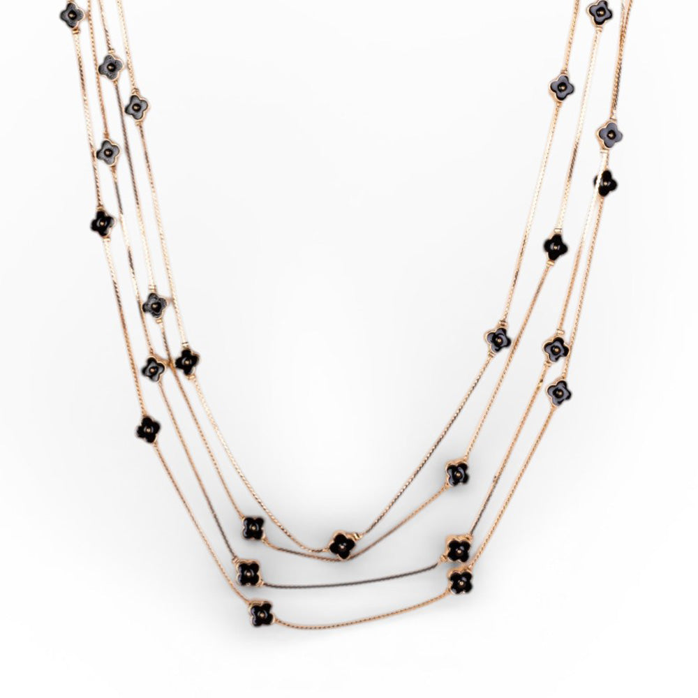 COLLANA LUNGA A TRE FILI CON ELEMENTI A FIORE