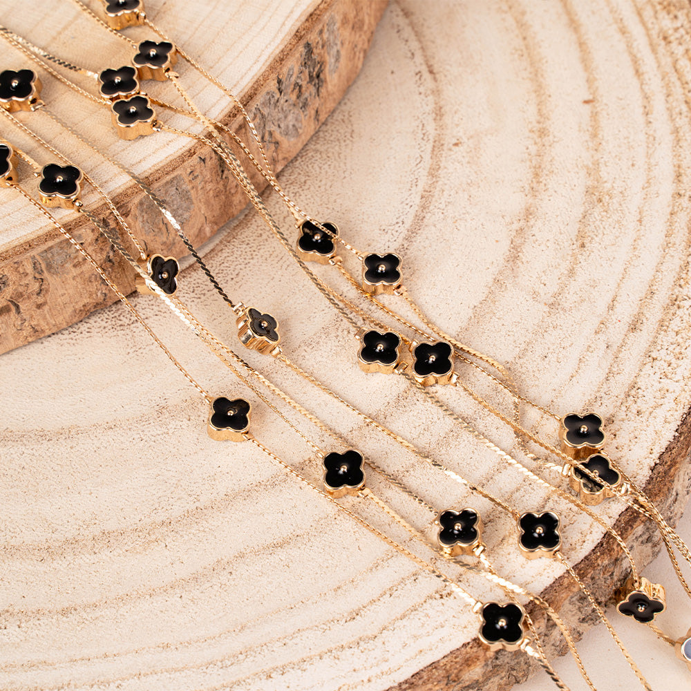 COLLANA LUNGA A TRE FILI CON ELEMENTI A FIORE