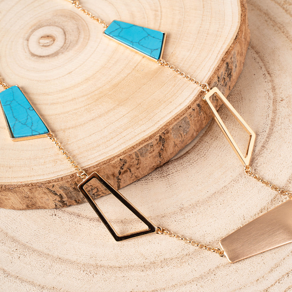 COLLANA LUNGA CON ELEMENTI GEOMETRICI MARMORIZZATI E SATINATI