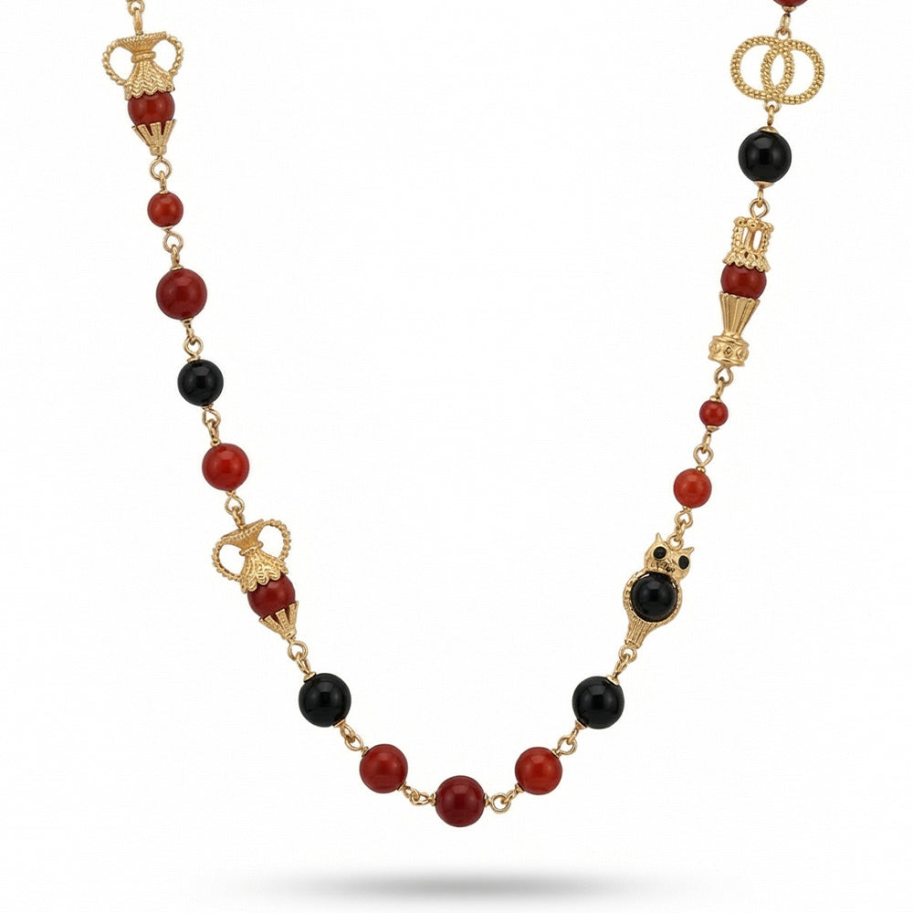 COLLANA LUNGA CON SFERE IN RESINA E ELEMENTI A FORMA DI GUFO E VASO