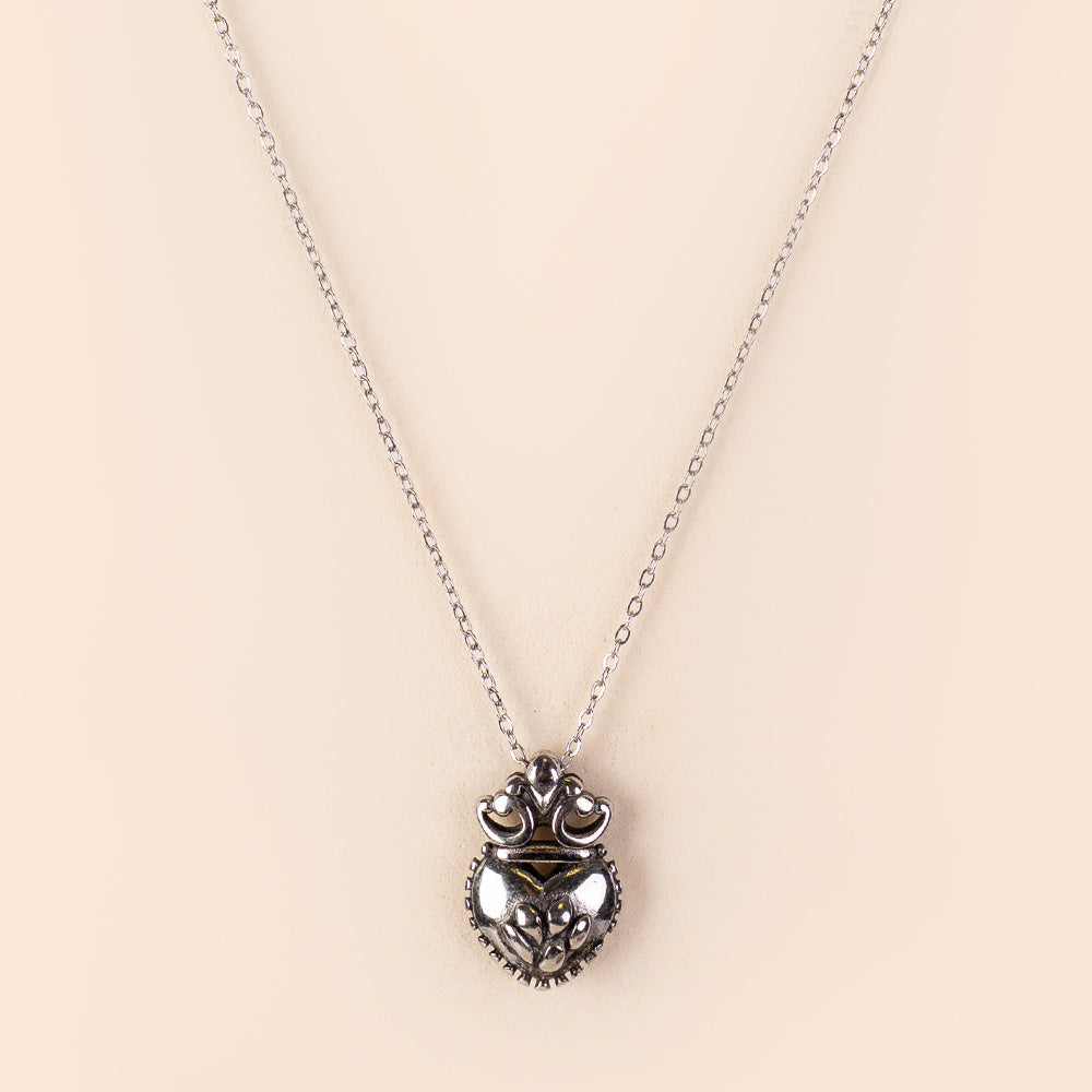 COLLANA A GIROCOLLO CON CUORE LAVORATO PENDENTE