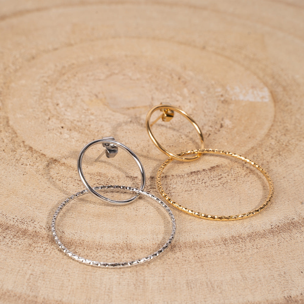 DANGLING EARRINGS WITH DOUBLE HOOP, ONE OF WHICH IS WORKED