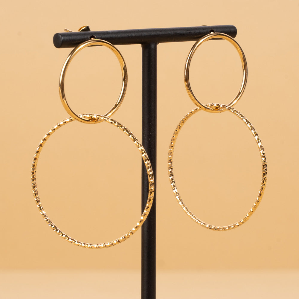 DANGLING EARRINGS WITH DOUBLE HOOP, ONE OF WHICH IS WORKED