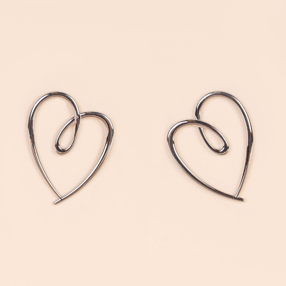 ORECCHINI  A CUORE OBLIQUO OUTLINE