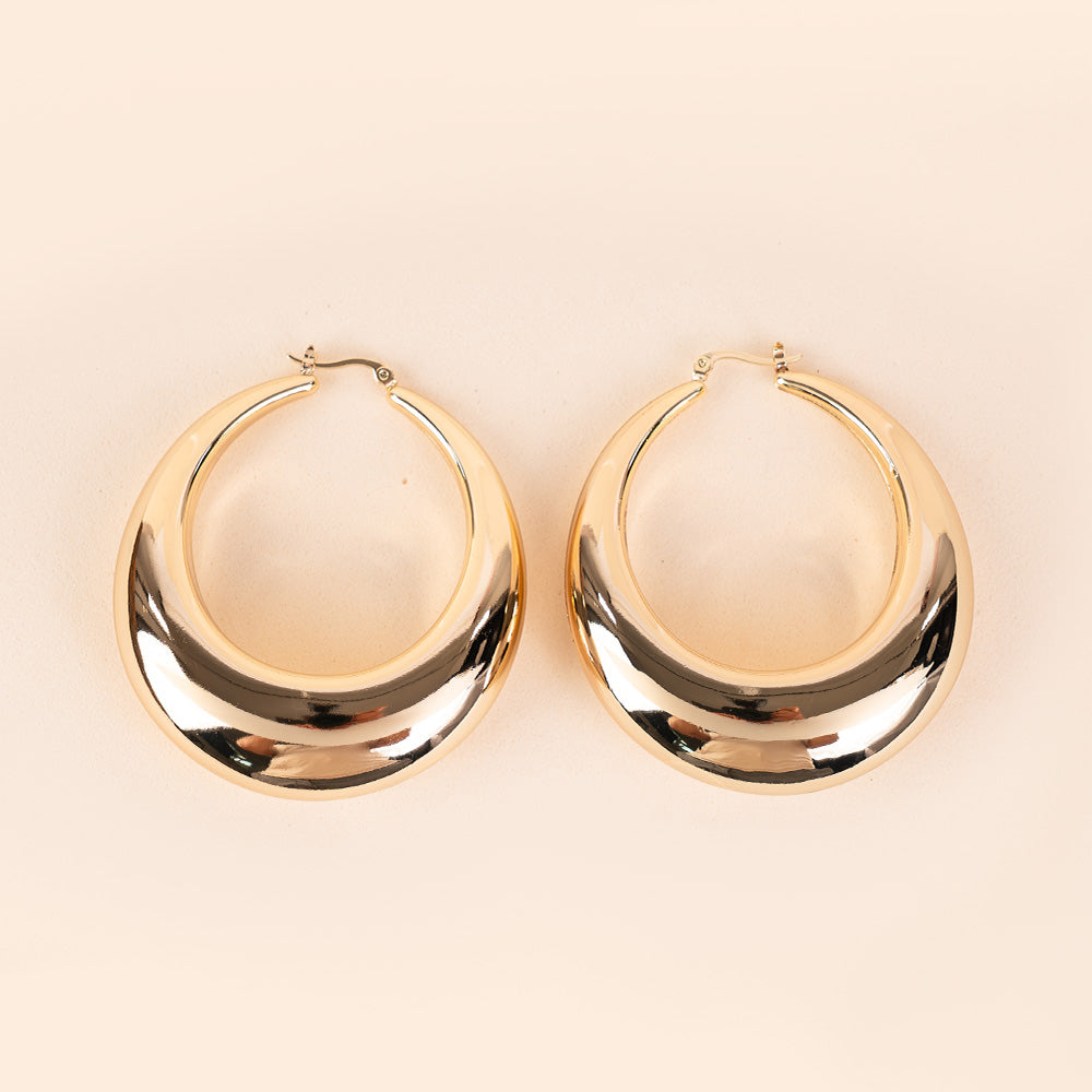 SMALL OVAL DANGLING EARRINGS WITH GRADUAL INCREASE