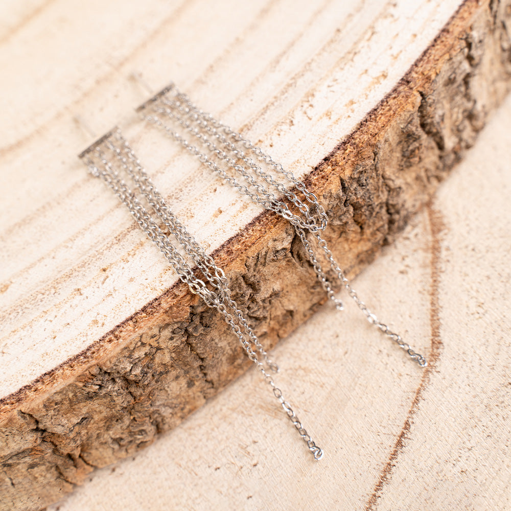 ORECCHINI PENDENTI CON TRE CATENE FINE