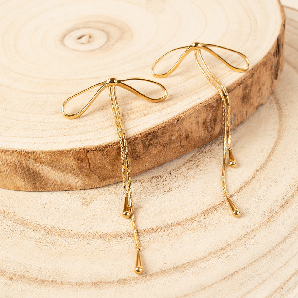 ORECCHINI PENDENTI A FIOCCO