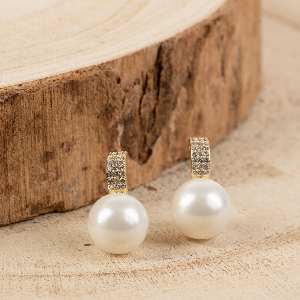 ORECCHINI PENDENTI CON PERLA SU SEMICERCHIO