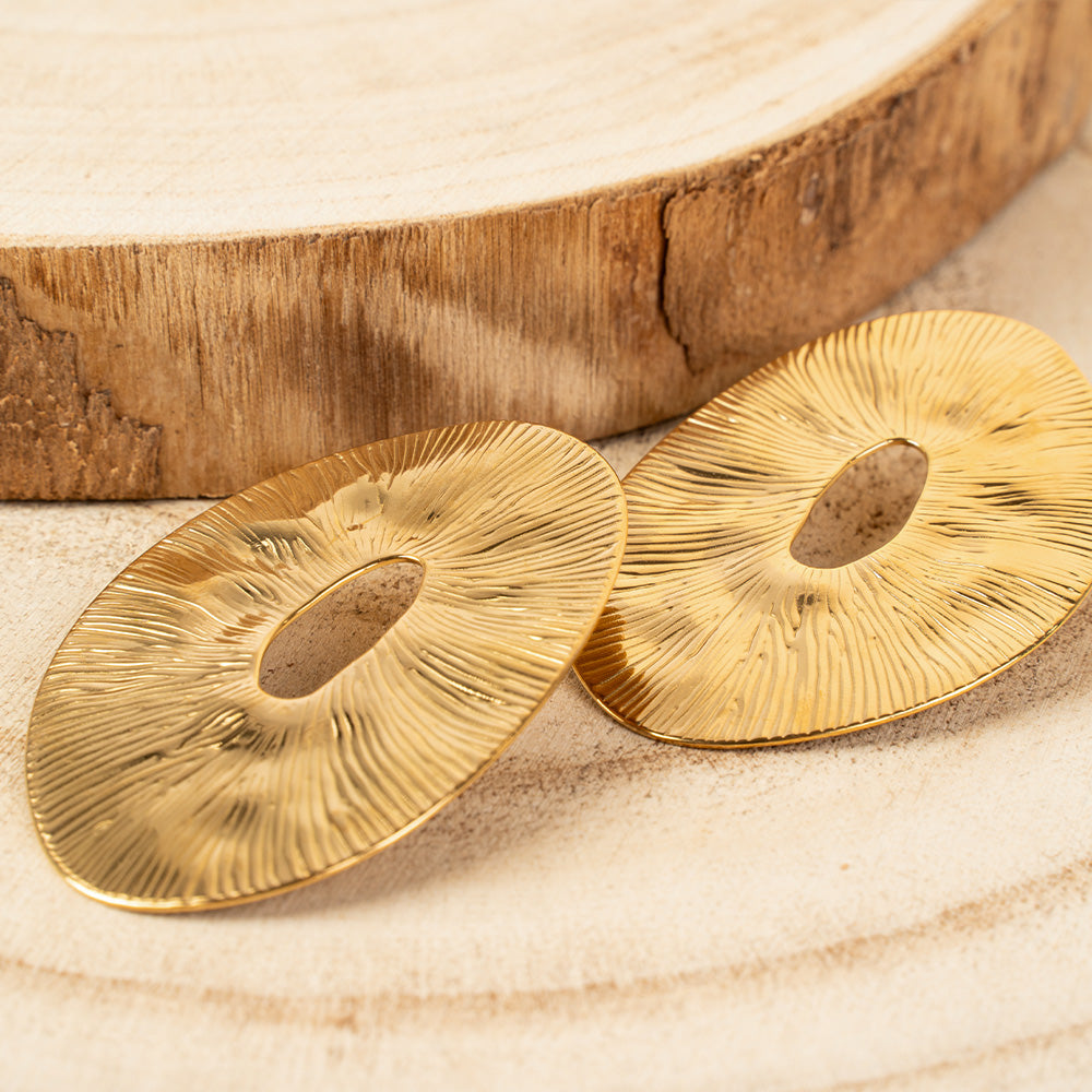 ORECCHINI PENDENTI A CERCHIO IRREGOLARE RIGATO