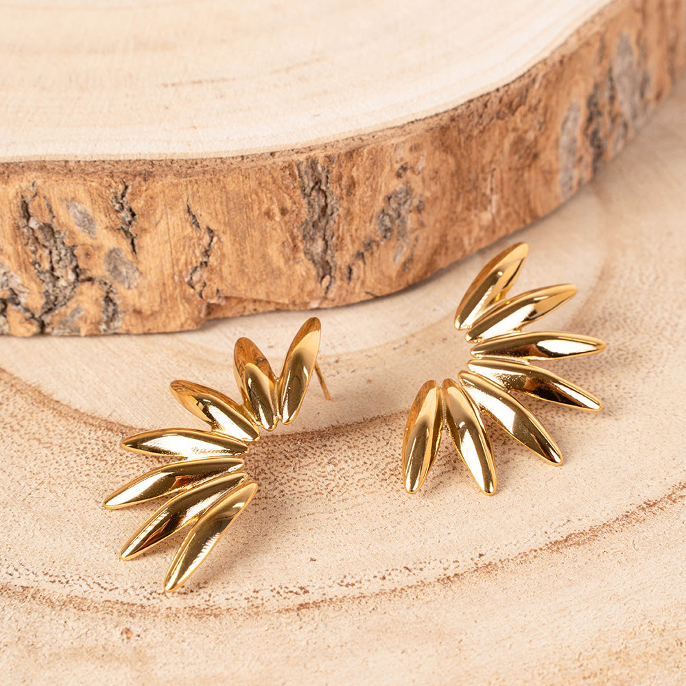 ORECCHINI A META' CON RAGGI A CHICCHI DI RISO