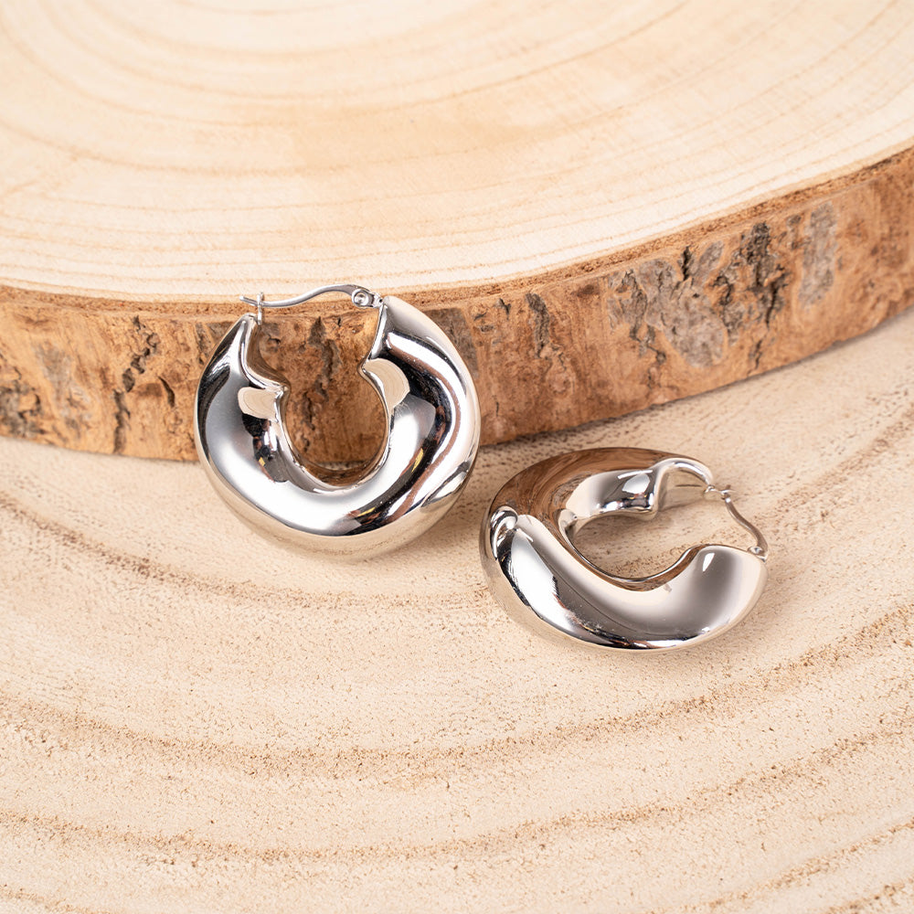 ORECCHINI PENDENTI CIRCOLARI ONDULATI