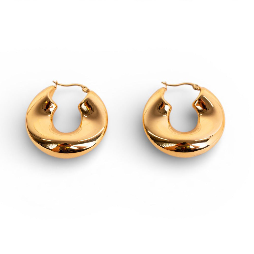 ORECCHINI PENDENTI CIRCOLARI ONDULATI