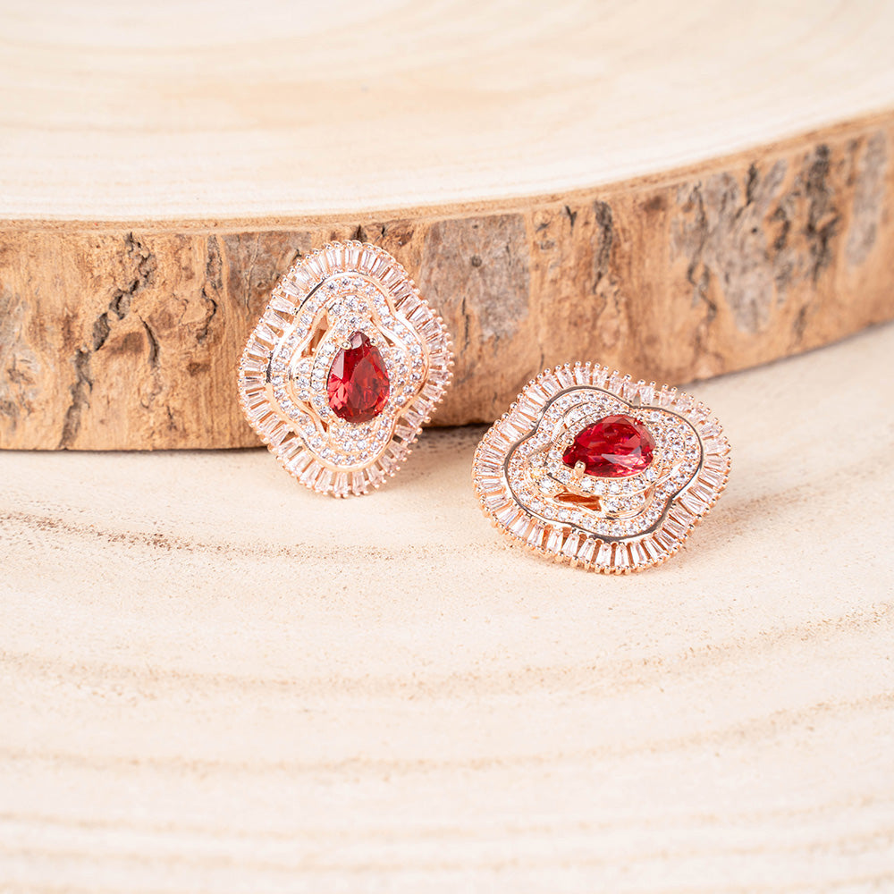 ORECCHINI CON CLIP CON GOCCIA CENTRALE E ROSONE D STRASS