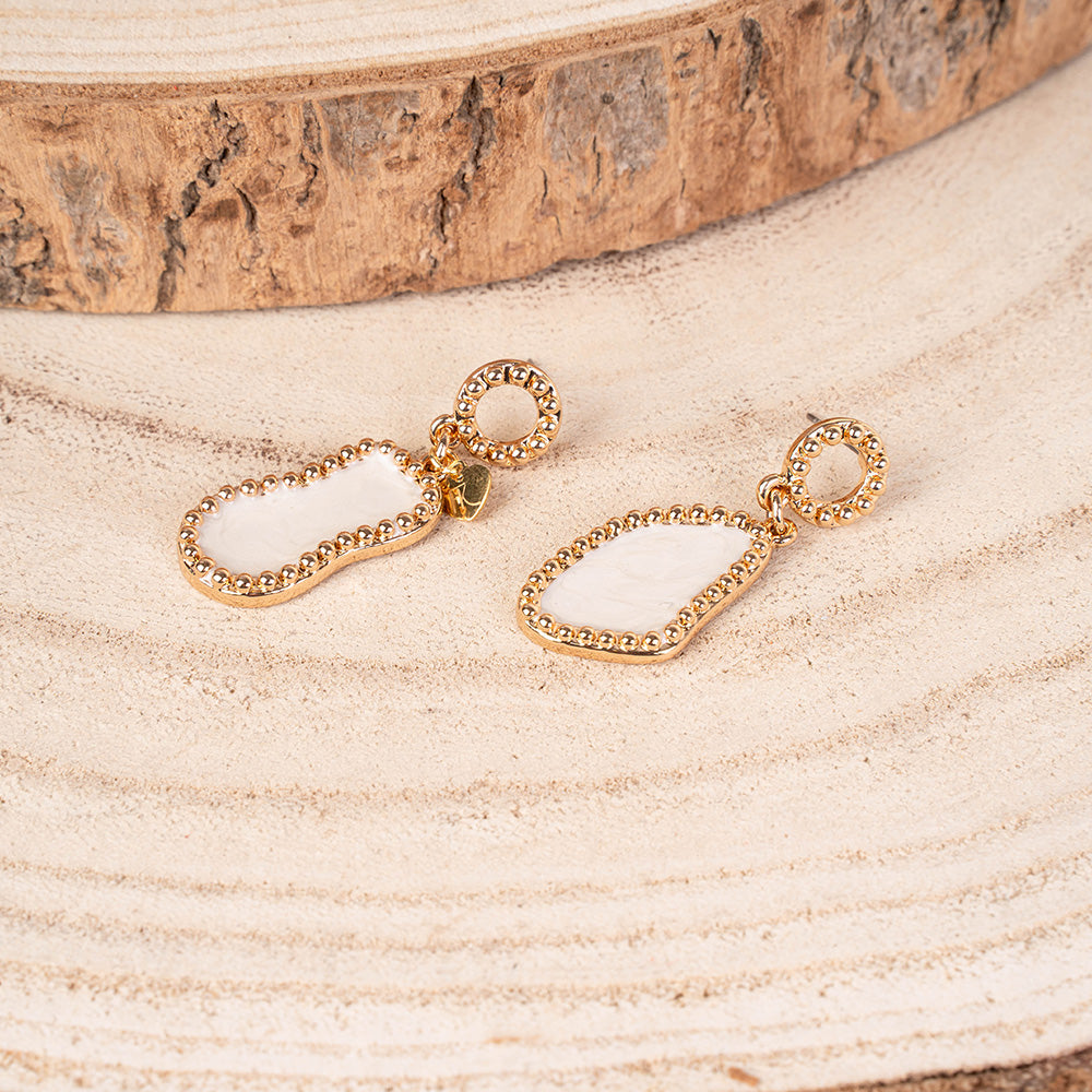 ORECCHINI PENDENTI CON ELEMENTI ASIMMETRICI