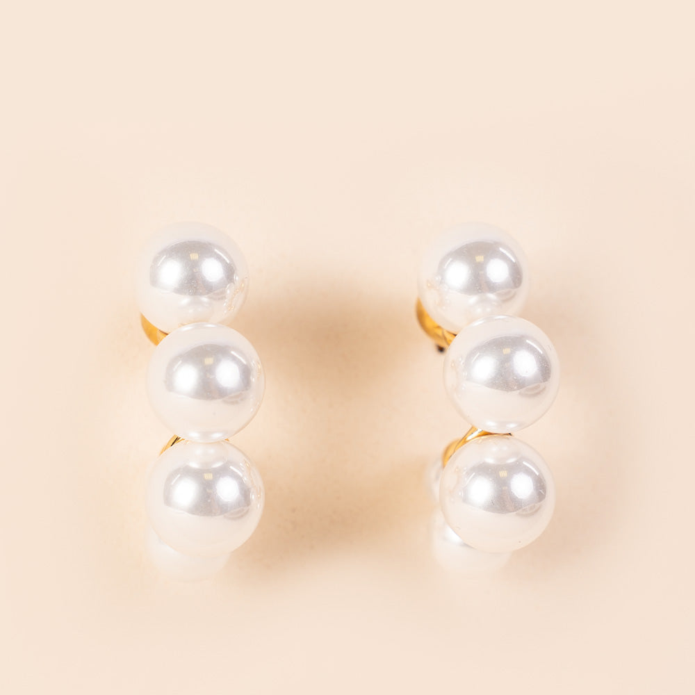 ORECCHINI CIRCOLARI CON PERLE APPLICATE