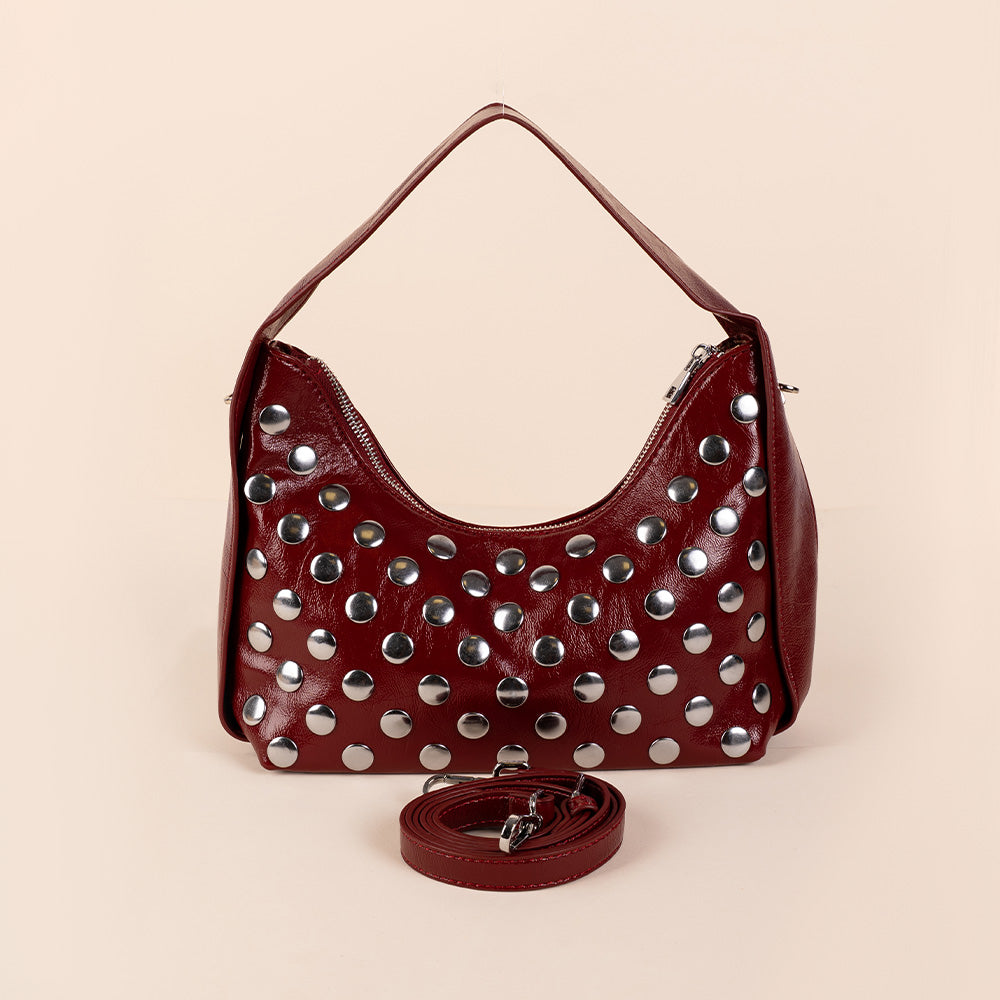 BORSA IN VERNICE LUCIDA CON BORCHIE E TRACOLLA