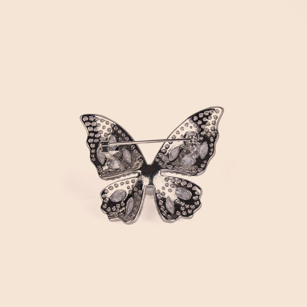 SPILLA CON STRASS E PERLE DALLA FORMA A FARFALLA