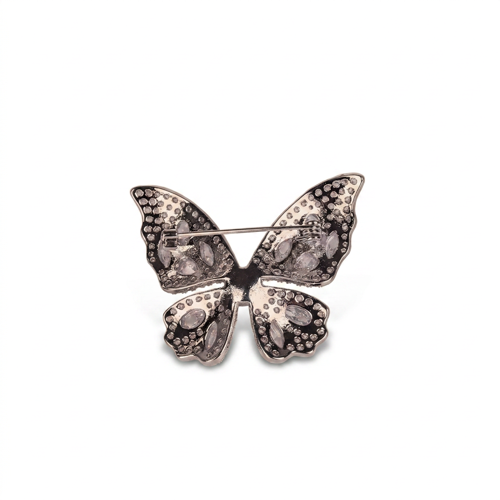 RHINESTONE AND PEARL BROOCH WITH A BUTTERFLY SHAPE