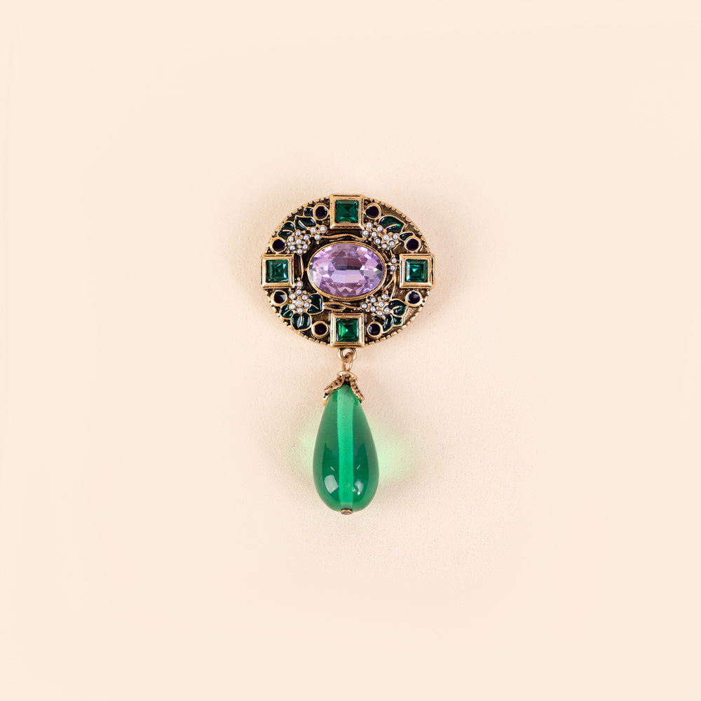 FLOWER BROOCH WITH CARVED ROSETTE AND VERTICAL PENDANT