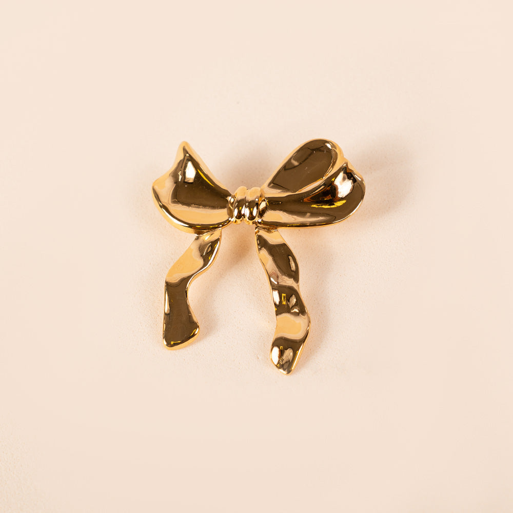 ASYMMETRIC BOW BROOCH