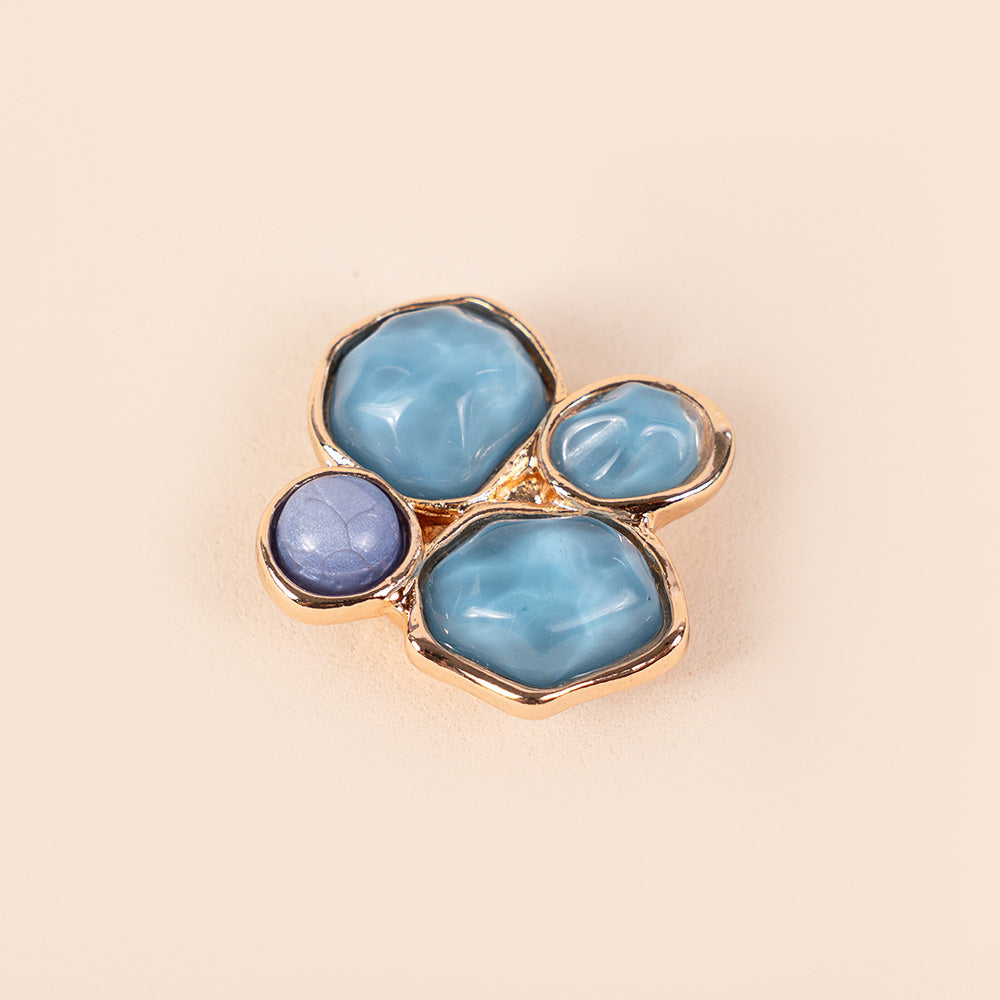 SMALL MAGNETIC PIN WITH FOUR ASYMMETRIC STONES