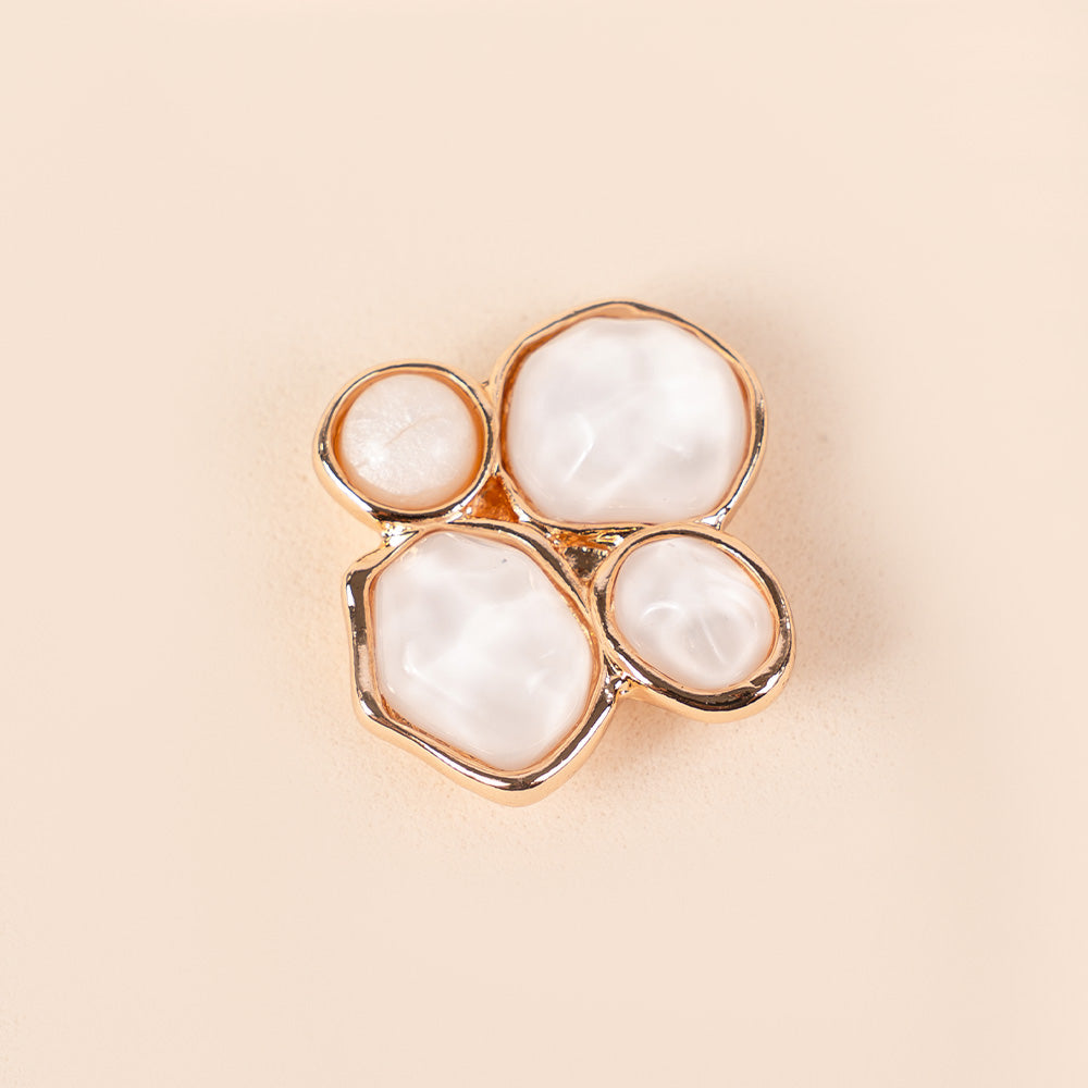 SMALL MAGNETIC PIN WITH FOUR ASYMMETRIC STONES