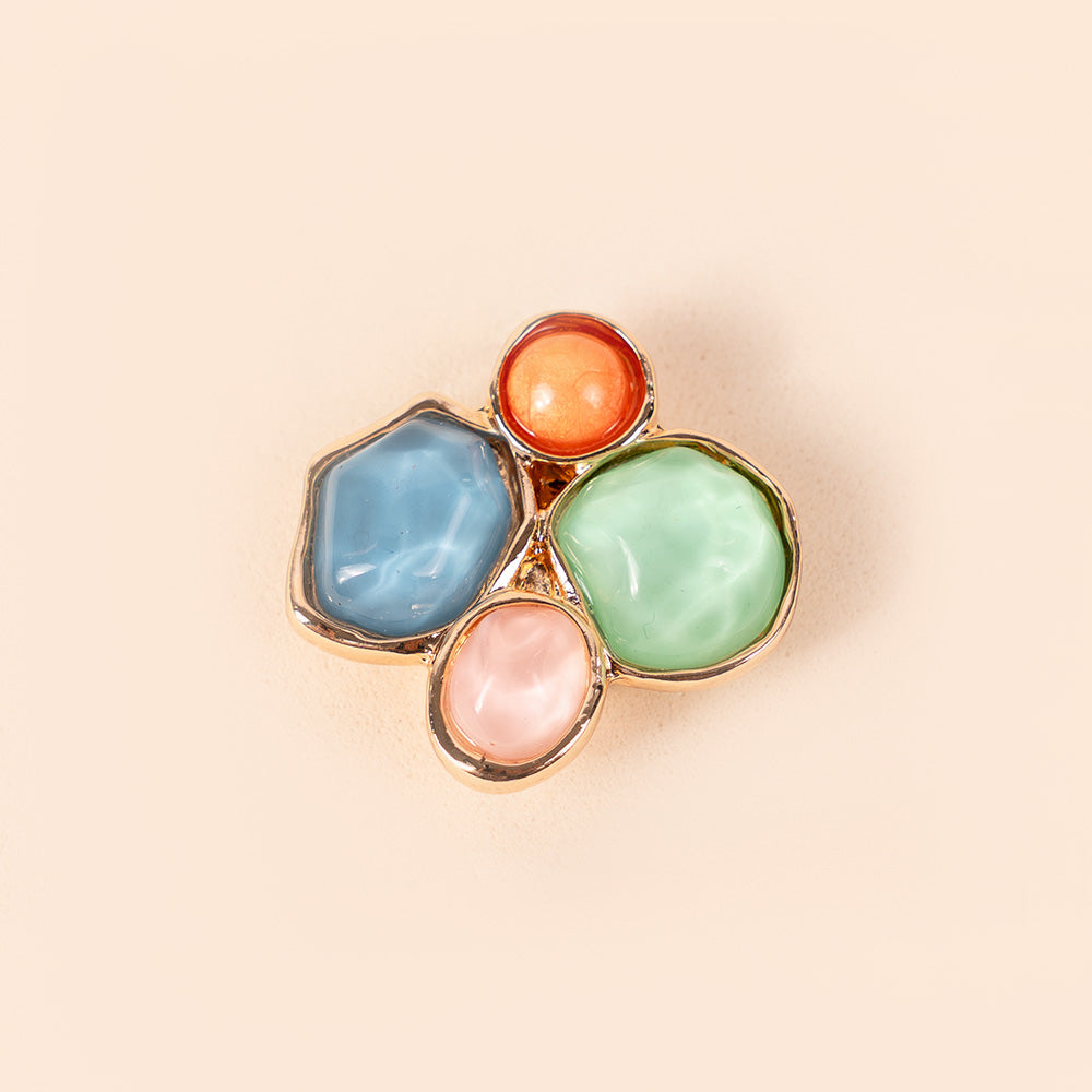 SMALL MAGNETIC PIN WITH FOUR ASYMMETRIC STONES