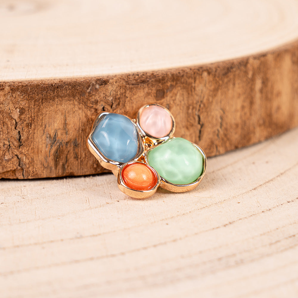 SMALL MAGNETIC PIN WITH FOUR ASYMMETRIC STONES