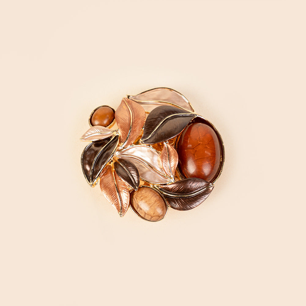 SPILLA ROTONDA CON FOGLIE E PIETRE