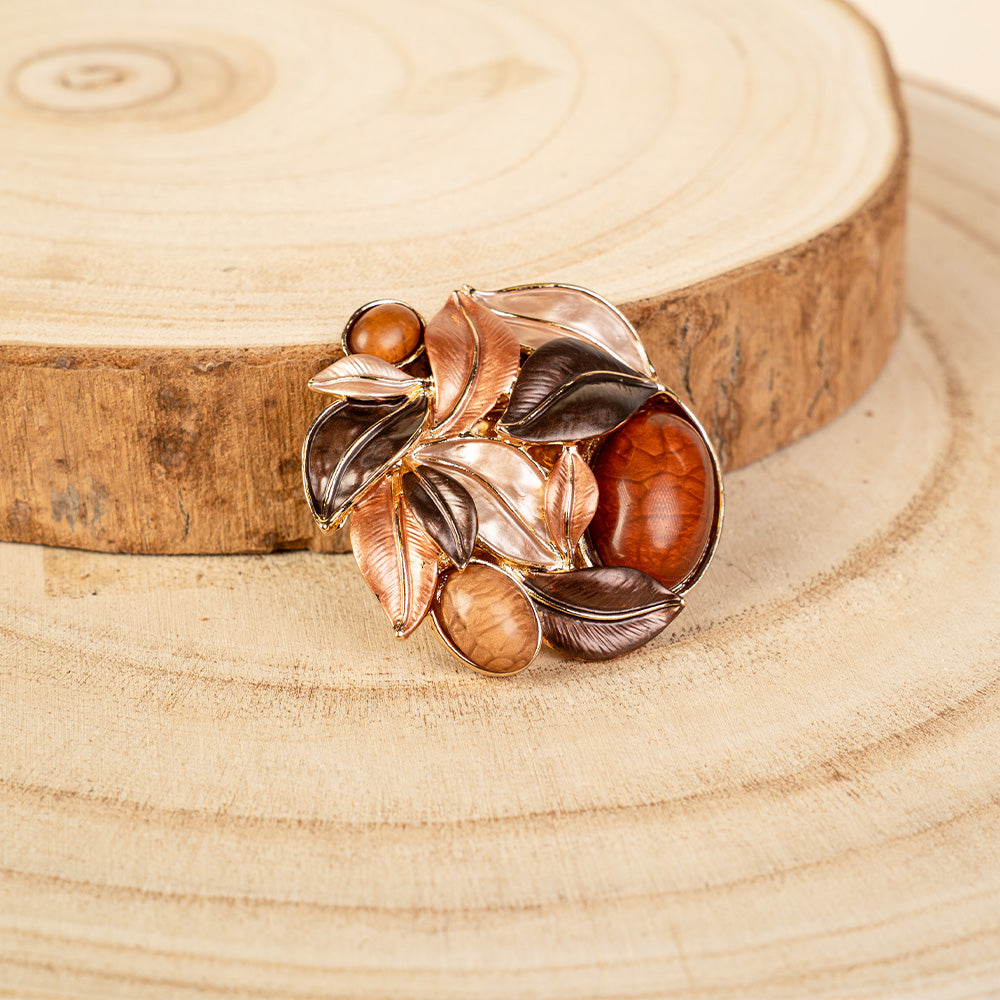 SPILLA ROTONDA CON FOGLIE E PIETRE